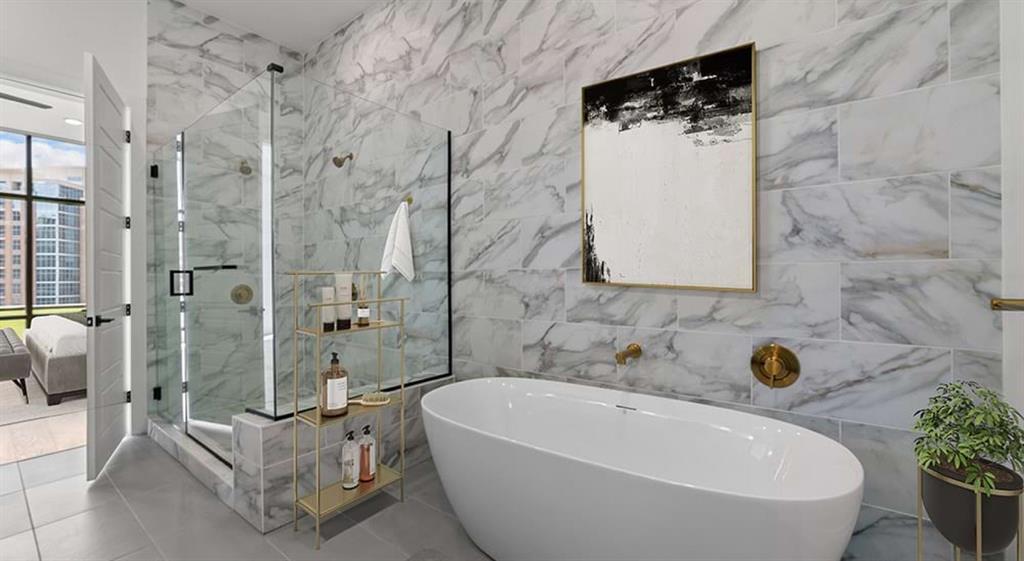 2620 Maple Avenue, Unit 1101 Dallas, TX 75201 - Photo 5 of 39 a bath tub sitting next to a bathroom