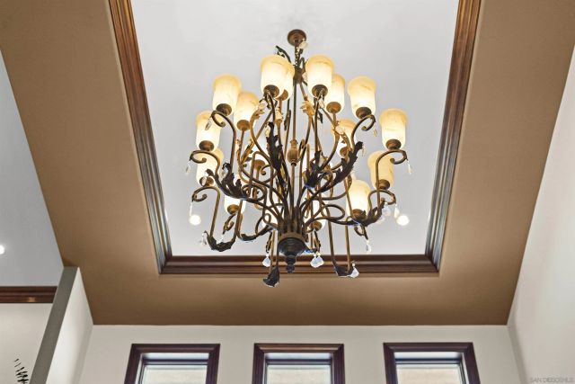 a kitchen with stainless steel appliances granite countertop a sink a stove and a wooden floors