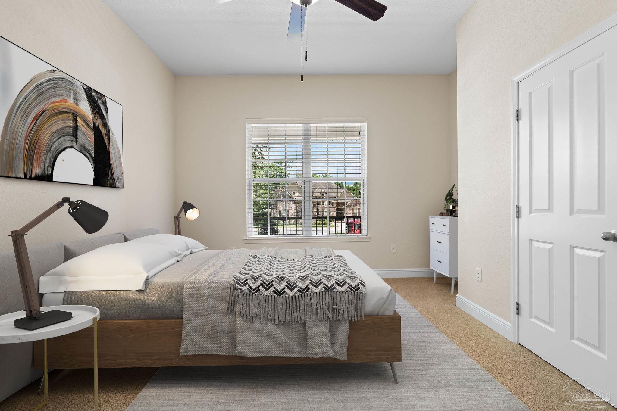 8664 Foxtail Loop Pensacola, FL 32526 - Photo 9 of 46 a bedroom with a bed and window