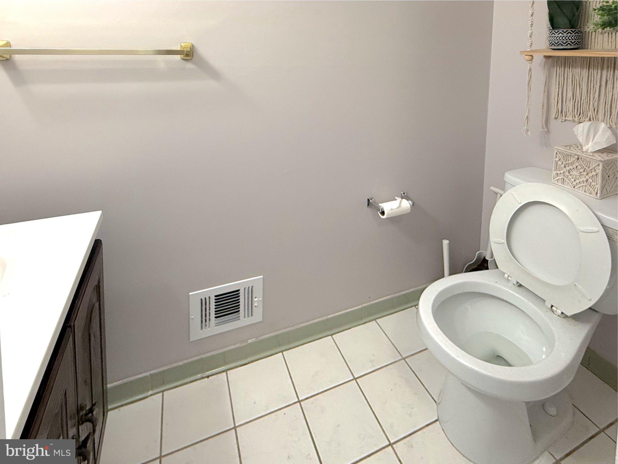 9006 Sidehill Road Ellicott City, MD 21042 - Photo 17 of 53 Modern bathroom with clean lines.