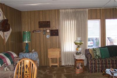 399 Ricardo Avenue, Unit 399 Santa Rosa, CA 95407 - Photo 3 of 11 a living room with furniture and a flat screen tv