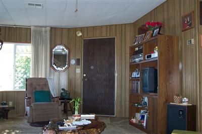 399 Ricardo Avenue, Unit 399 Santa Rosa, CA 95407 - Photo 7 of 11 a living room with furniture and a mirror
