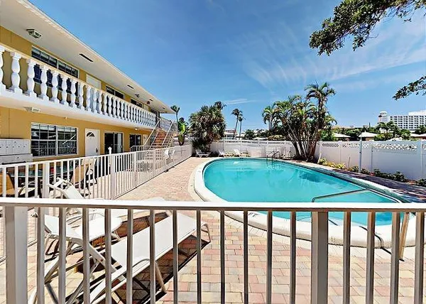 a view of a house with a swimming pool
