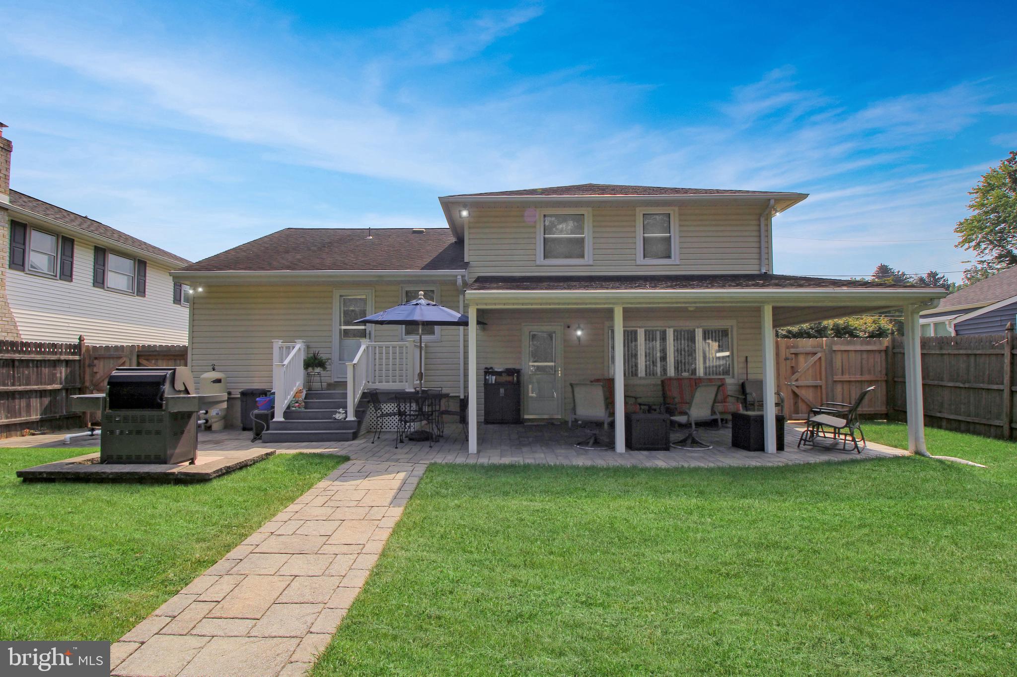 9702 Wynmill Road Philadelphia, PA 19115 - Photo 11 of 35 a view of a house with a yard and sitting area