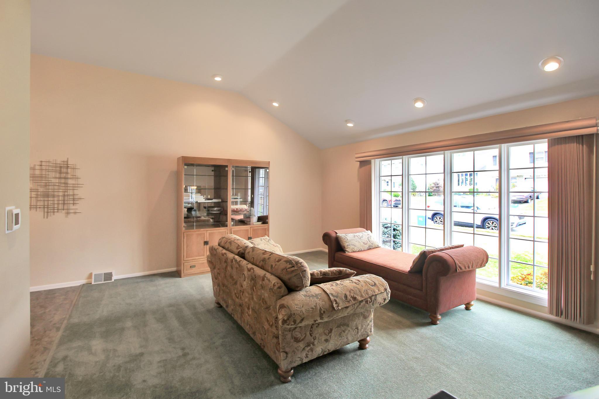 9702 Wynmill Road Philadelphia, PA 19115 - Photo 17 of 35 a living room with furniture and a large window