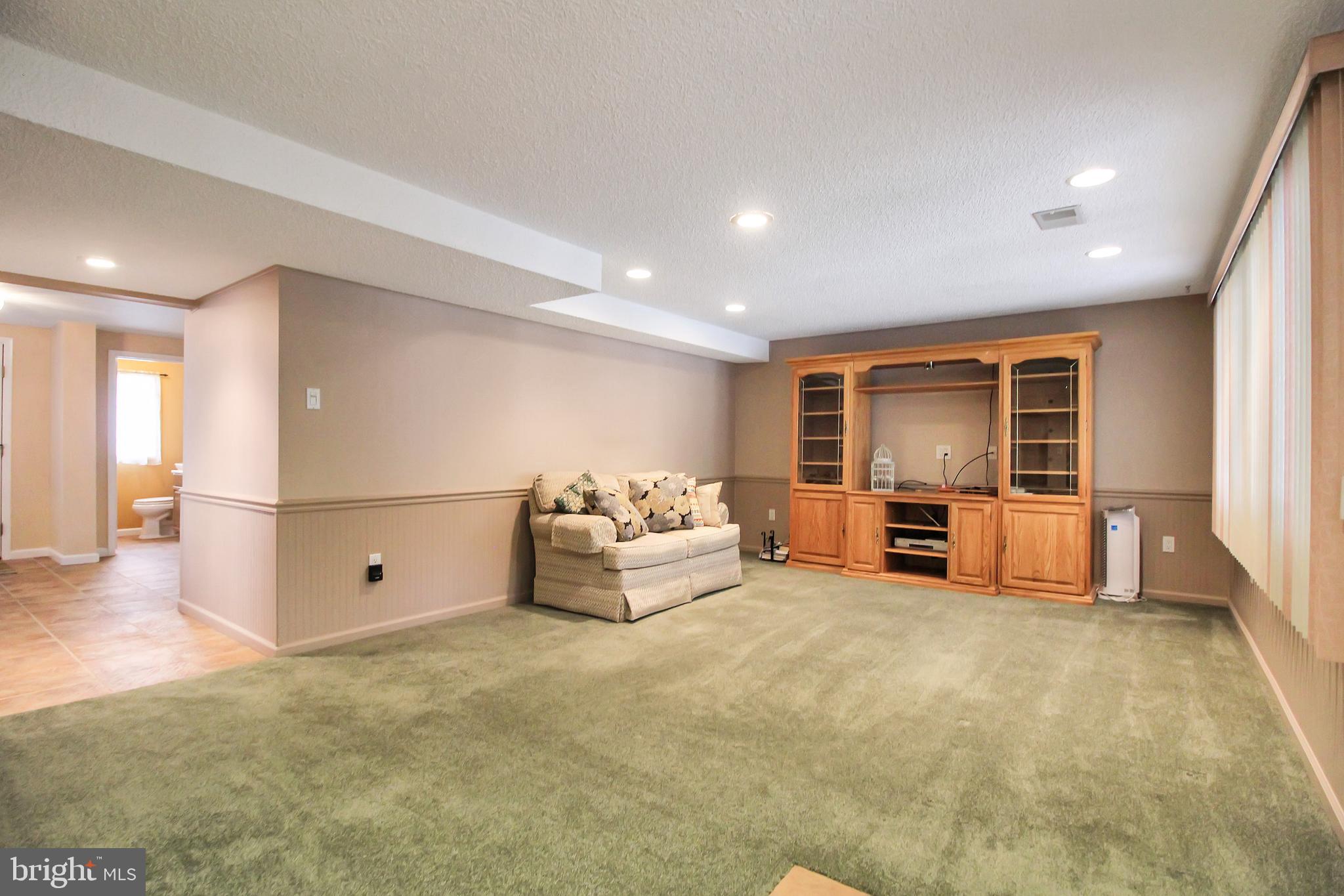 9702 Wynmill Road Philadelphia, PA 19115 - Photo 23 of 35 a view of a livingroom with table and couch