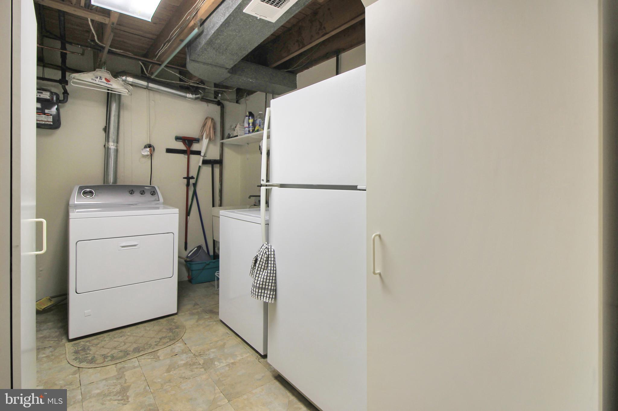 9702 Wynmill Road Philadelphia, PA 19115 - Photo 35 of 35 a utility room with dryer and washer