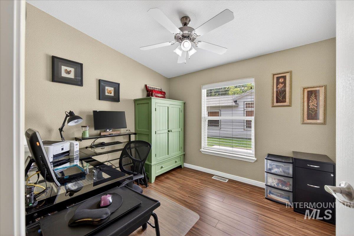 421 South Curtis Road, Unit 118 Boise, ID 83705 - Photo 25 of 49 Office space featuring dark wood-style floors and ceiling fan