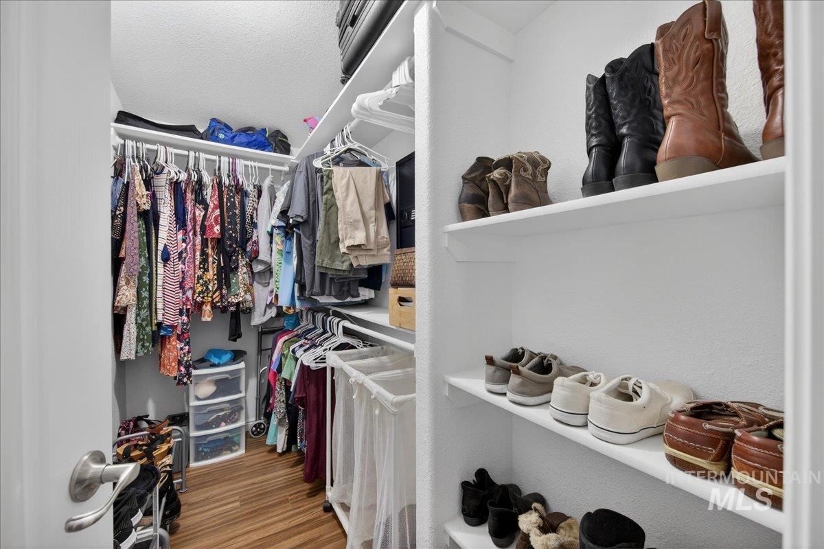 421 South Curtis Road, Unit 118 Boise, ID 83705 - Photo 35 of 49 Walk in closet with light wood finished floors