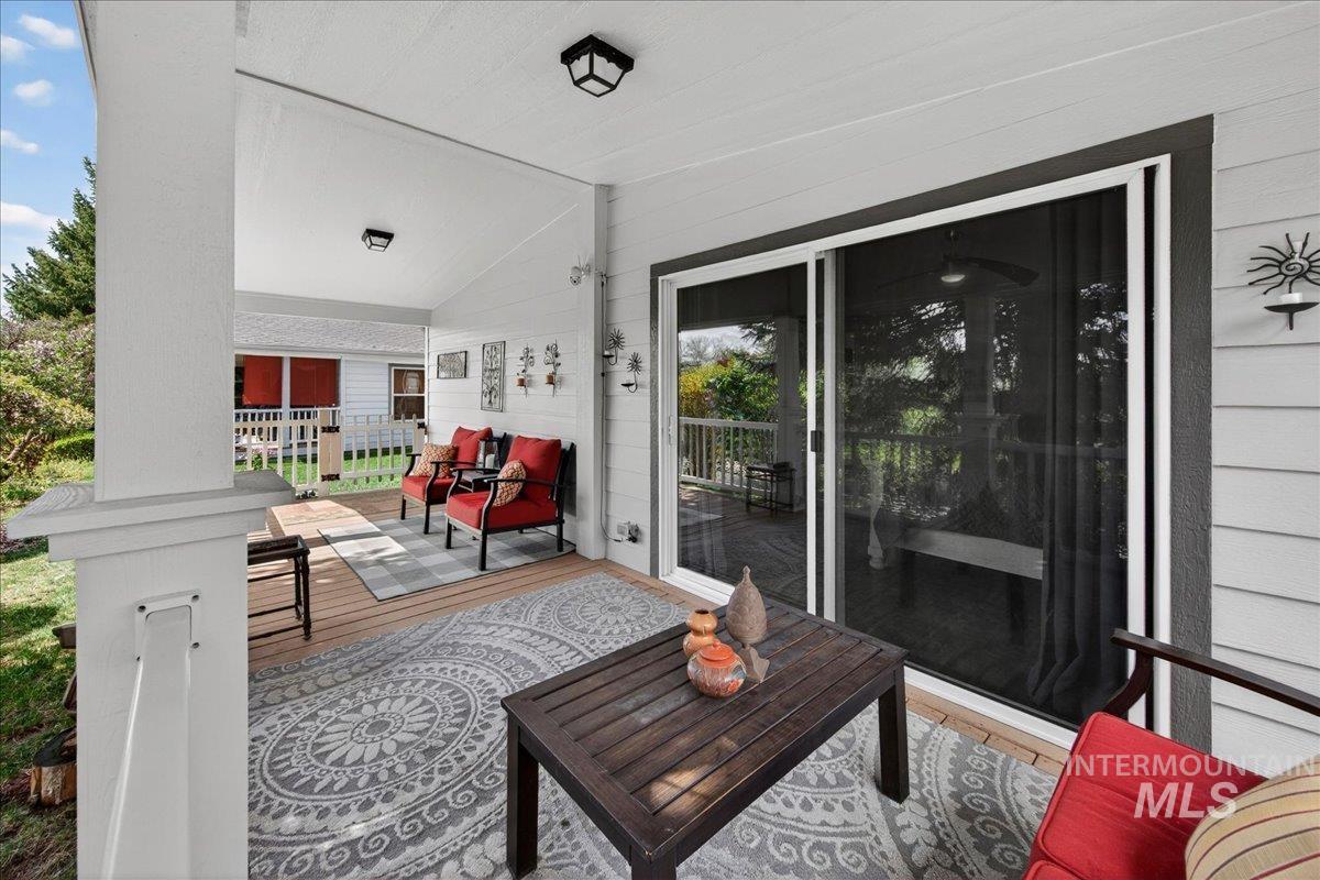 421 South Curtis Road, Unit 118 Boise, ID 83705 - Photo 37 of 49 Wooden porch with an outdoor lounge area