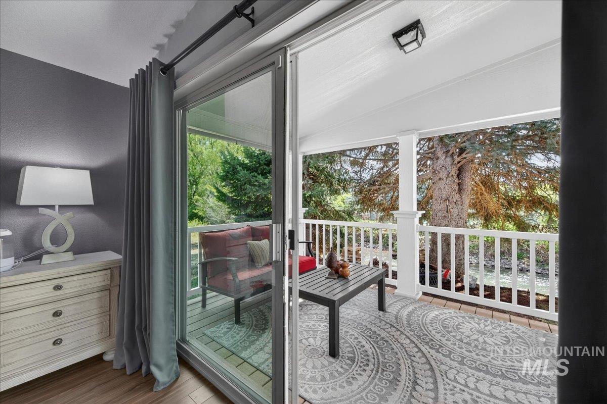 421 South Curtis Road, Unit 118 Boise, ID 83705 - Photo 49 of 49 Entryway featuring wood finished floors and vaulted ceiling
