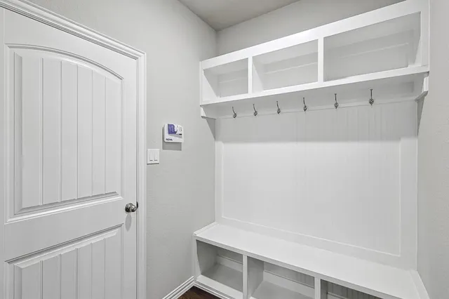 a view of an empty walk in closet