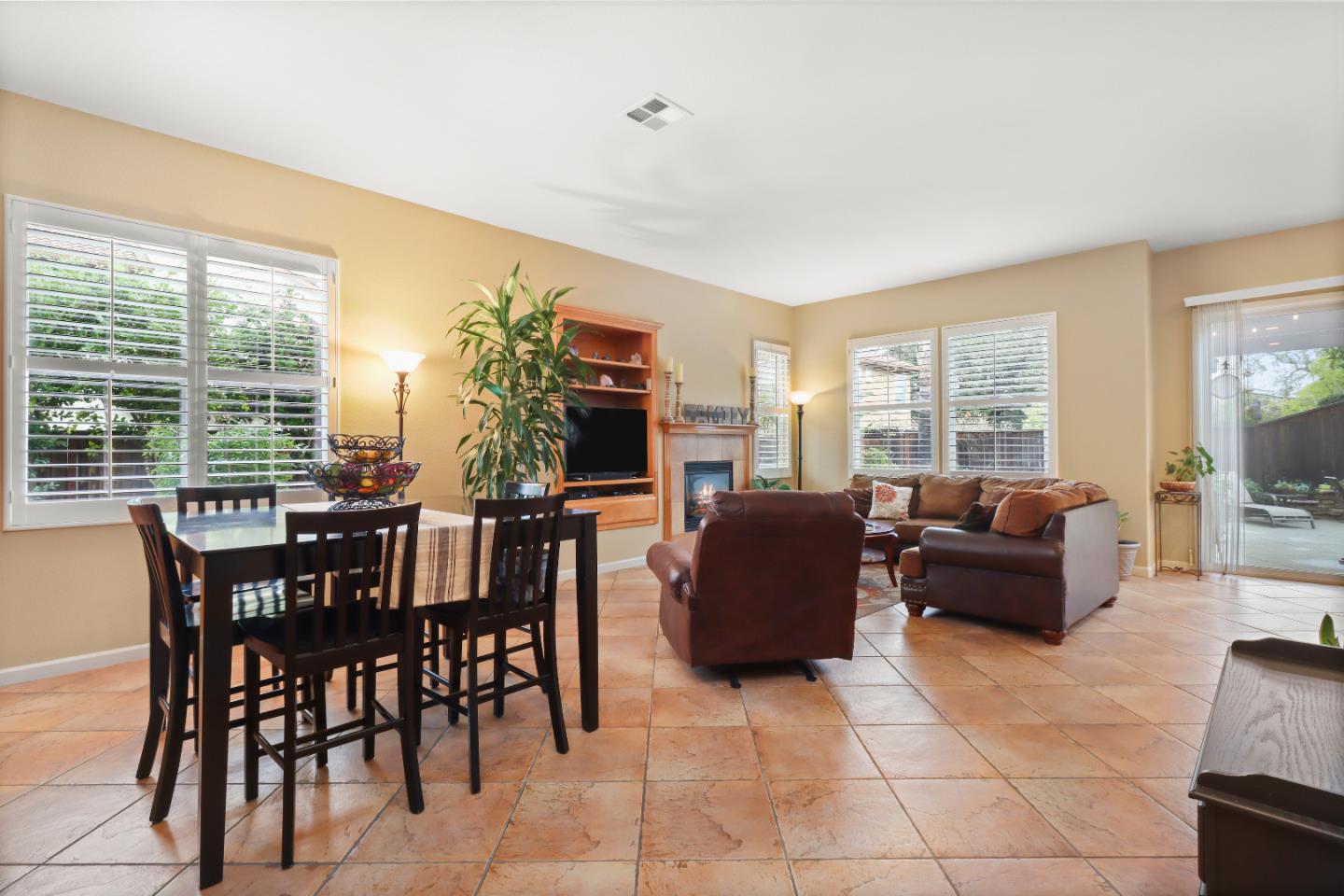 1960 County Down Way Gilroy, CA 95020 - Photo 12 of 62 a living room with furniture and a floor to ceiling window