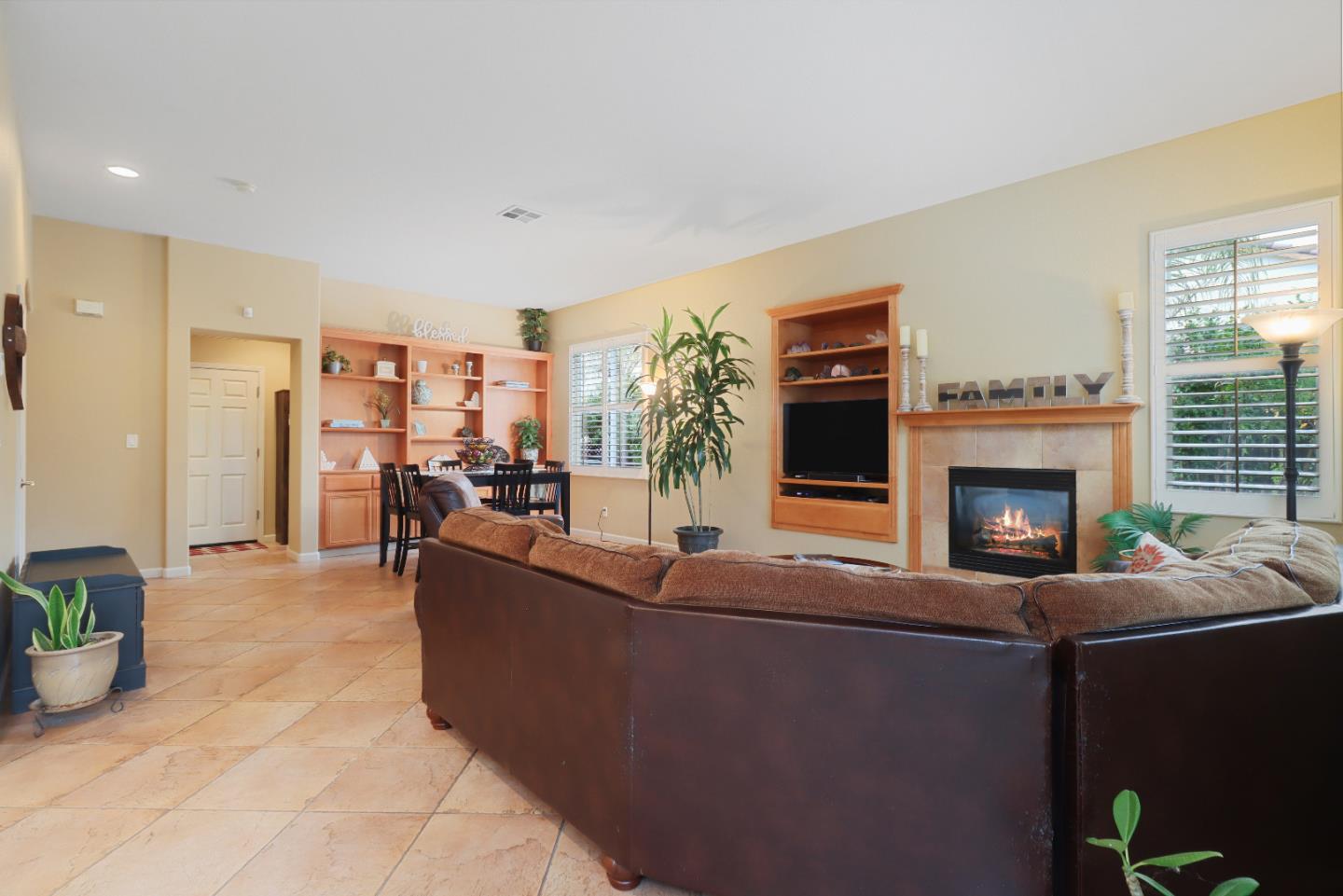1960 County Down Way Gilroy, CA 95020 - Photo 13 of 62 a living room with furniture and a fireplace