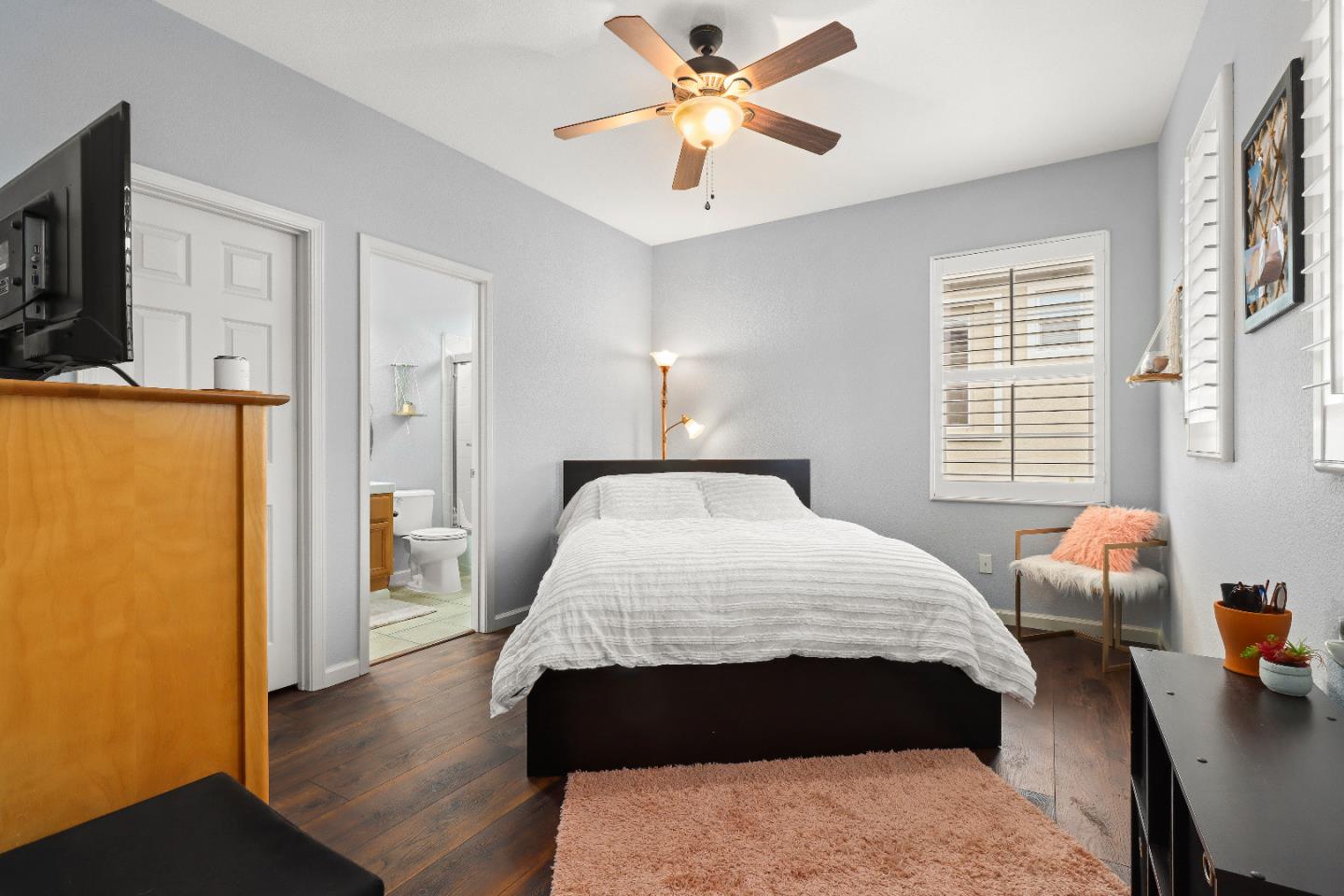 1960 County Down Way Gilroy, CA 95020 - Photo 29 of 62 a bedroom with a bed and a chandelier