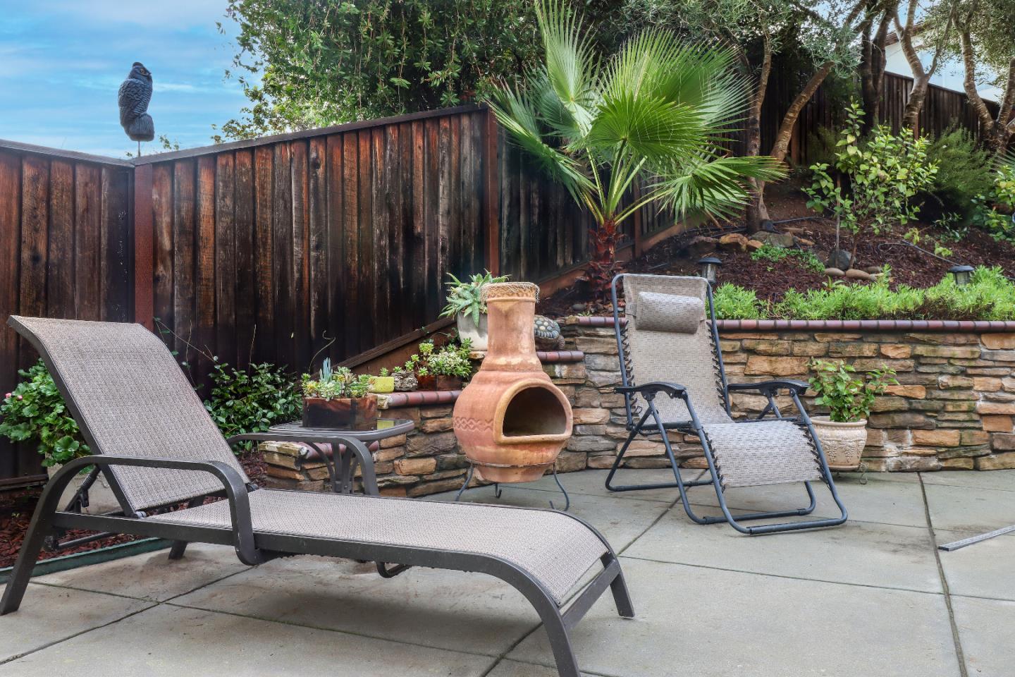 1960 County Down Way Gilroy, CA 95020 - Photo 46 of 62 a view of backyard with a patio and outdoor seating