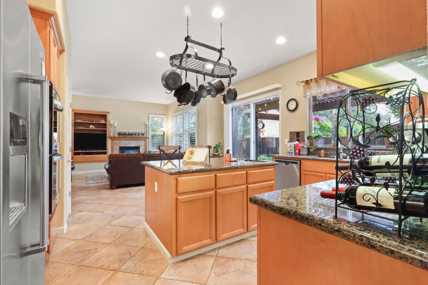 1960 County Down Way Gilroy, CA 95020 - Photo 9 of 62 a kitchen with stainless steel appliances granite countertop a sink and a refrigerator