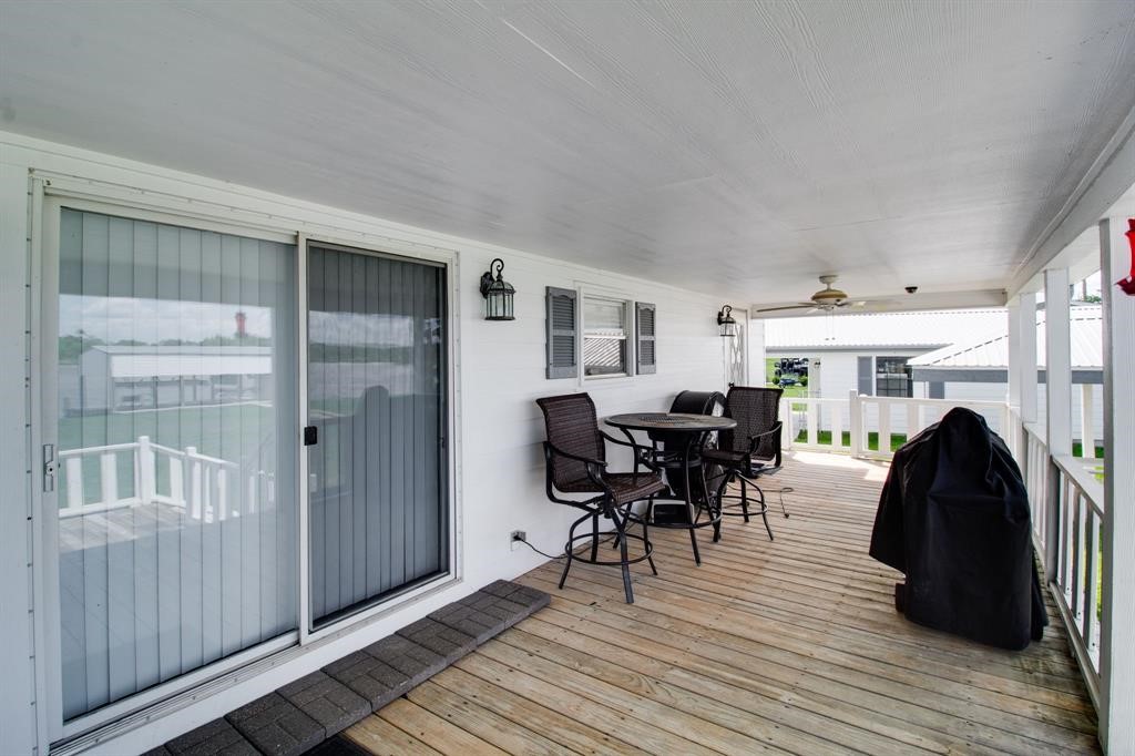 122 Read Oak Onalaska, TX 77360 - Photo 21 of 34 a living room with furniture and a wooden floor