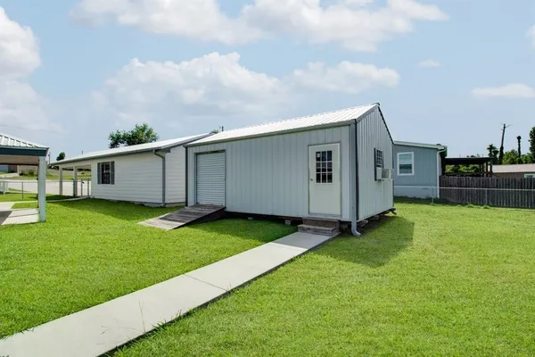 a view of a backyard with a garden