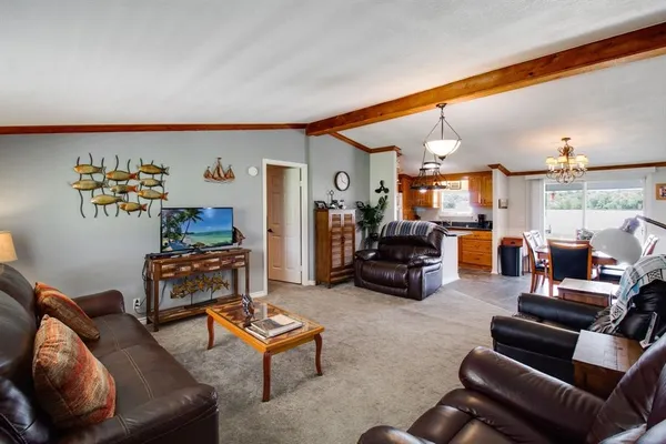a living room filled with furniture and a couch