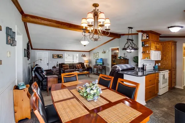 a view of a livingroom and dining room