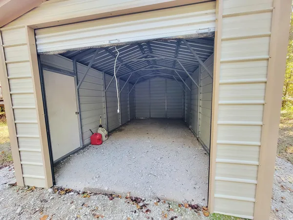 a view of swimming pool with a patio