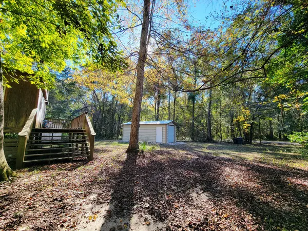 a view of deck with wooden floor and outdoor seating