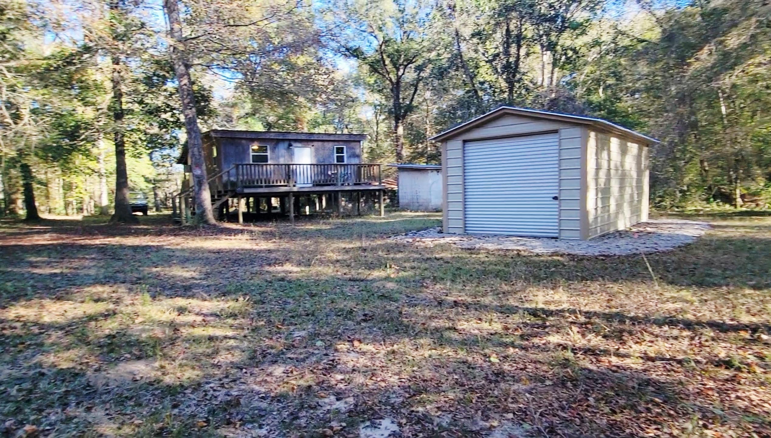 1907 River Road Ponce de Leon, FL 32455 - Photo 5 of 63 a view of a house with a yard