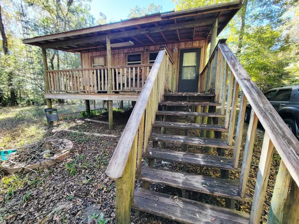a view of a backyard of a house