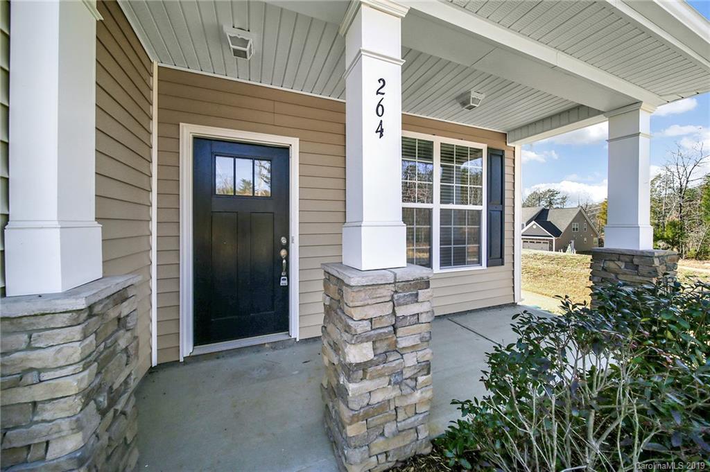 264 Annatto Way Tega Cay, SC 29708 - Photo 3 of 36 a front view of a house with large windows
