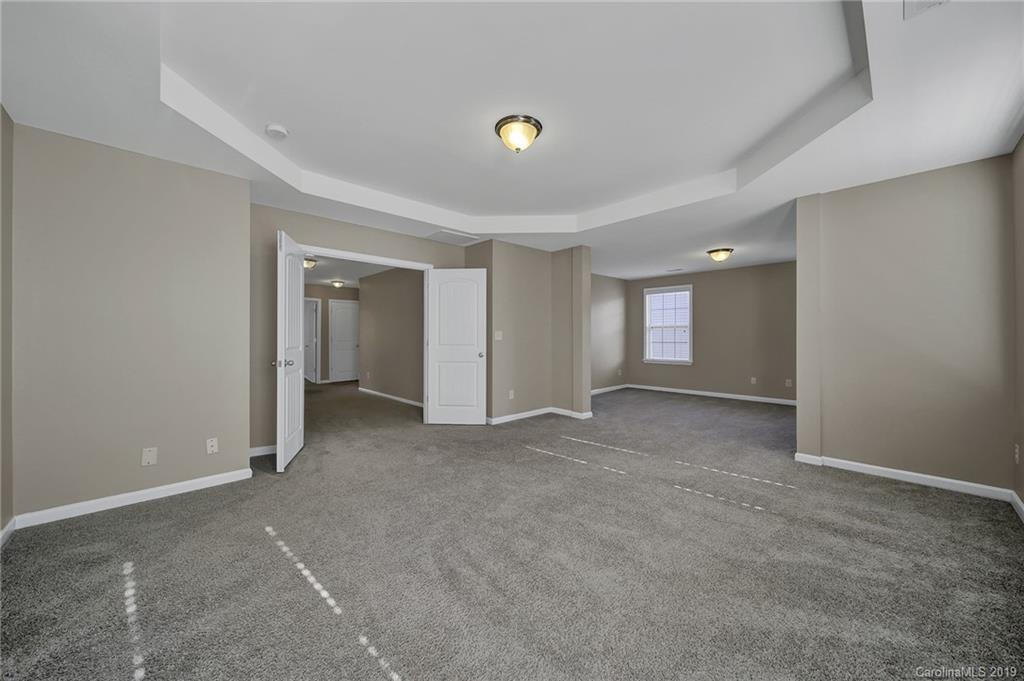 264 Annatto Way Tega Cay, SC 29708 - Photo 23 of 36 a view of an empty room and window