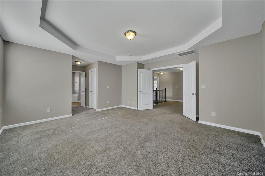 264 Annatto Way Tega Cay, SC 29708 - Photo 24 of 36 a view of an empty room with a window