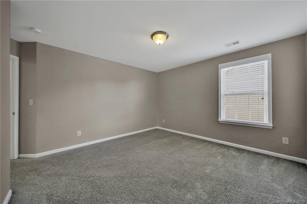 264 Annatto Way Tega Cay, SC 29708 - Photo 28 of 36 an empty room with windows