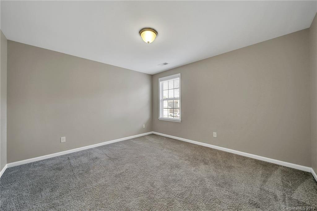 264 Annatto Way Tega Cay, SC 29708 - Photo 30 of 36 a view of an empty room with a window