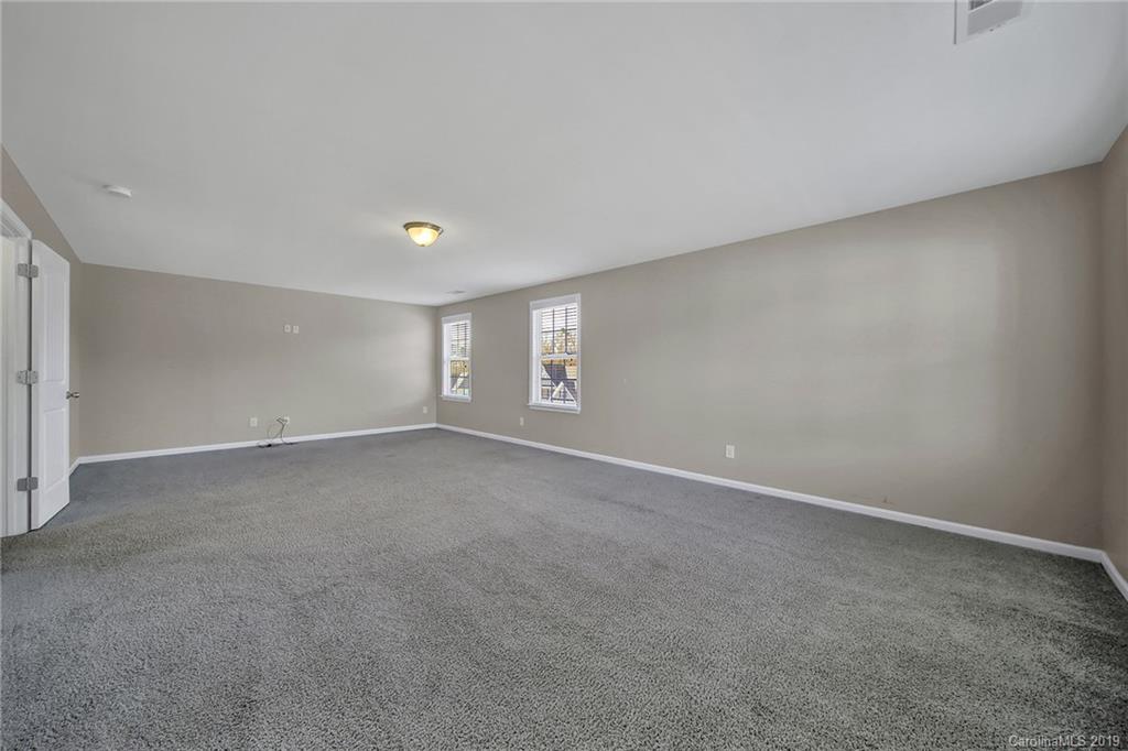 264 Annatto Way Tega Cay, SC 29708 - Photo 33 of 36 a view of an empty room with a window