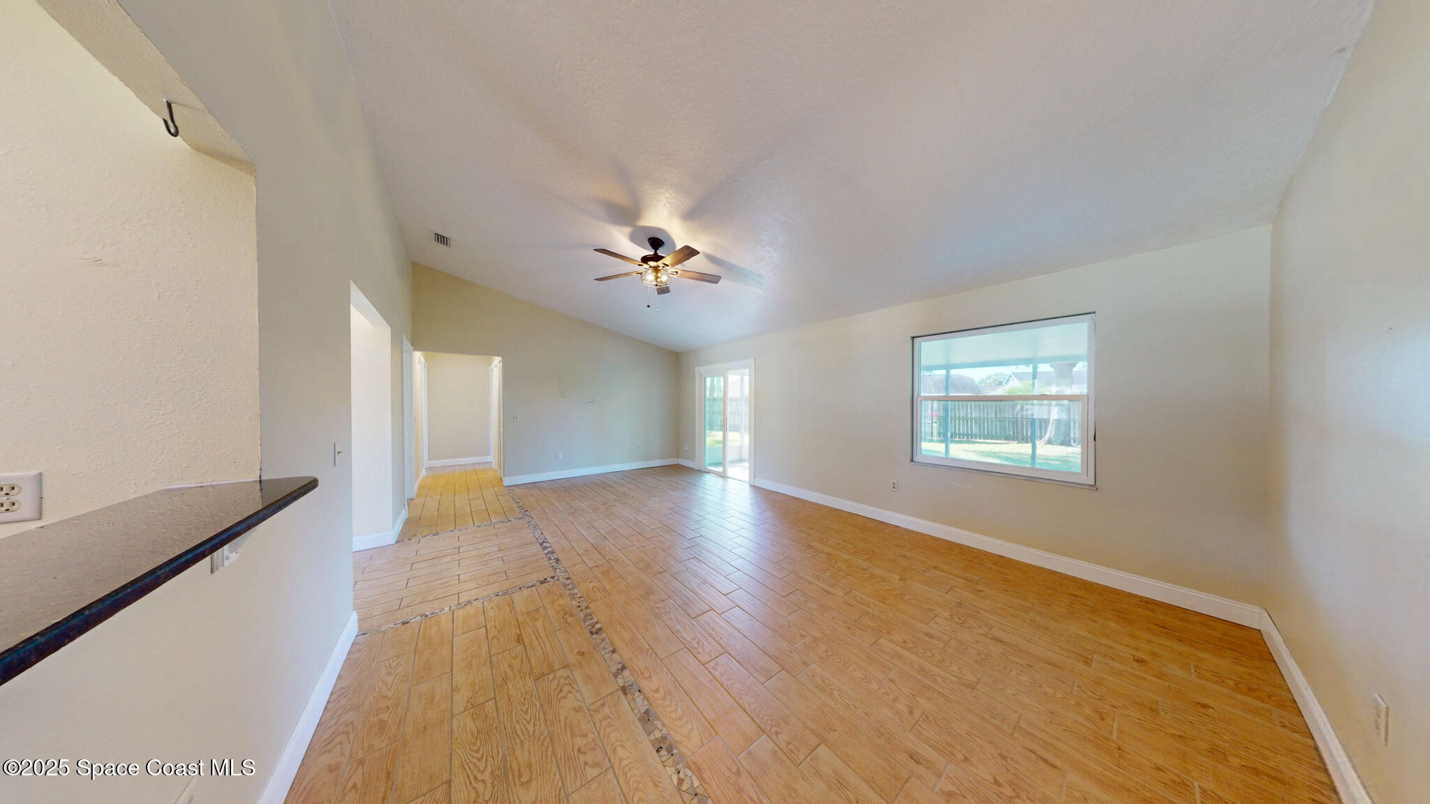 871 Southern Pine Trail Rockledge, FL 32955 - Photo 11 of 36 a view of livingroom and hardwood floor