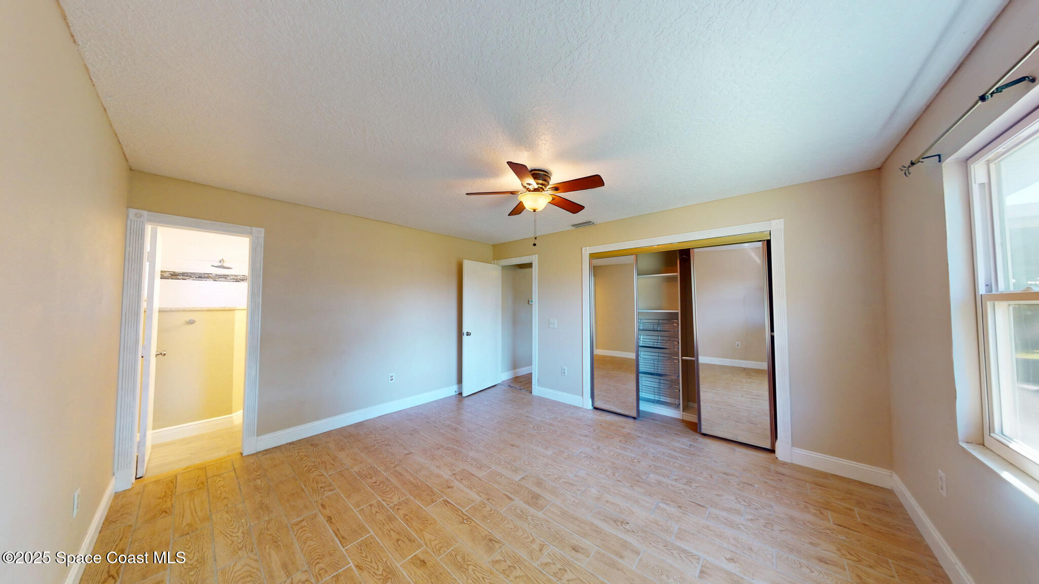 871 Southern Pine Trail Rockledge, FL 32955 - Photo 15 of 37 a view of an empty room with a window