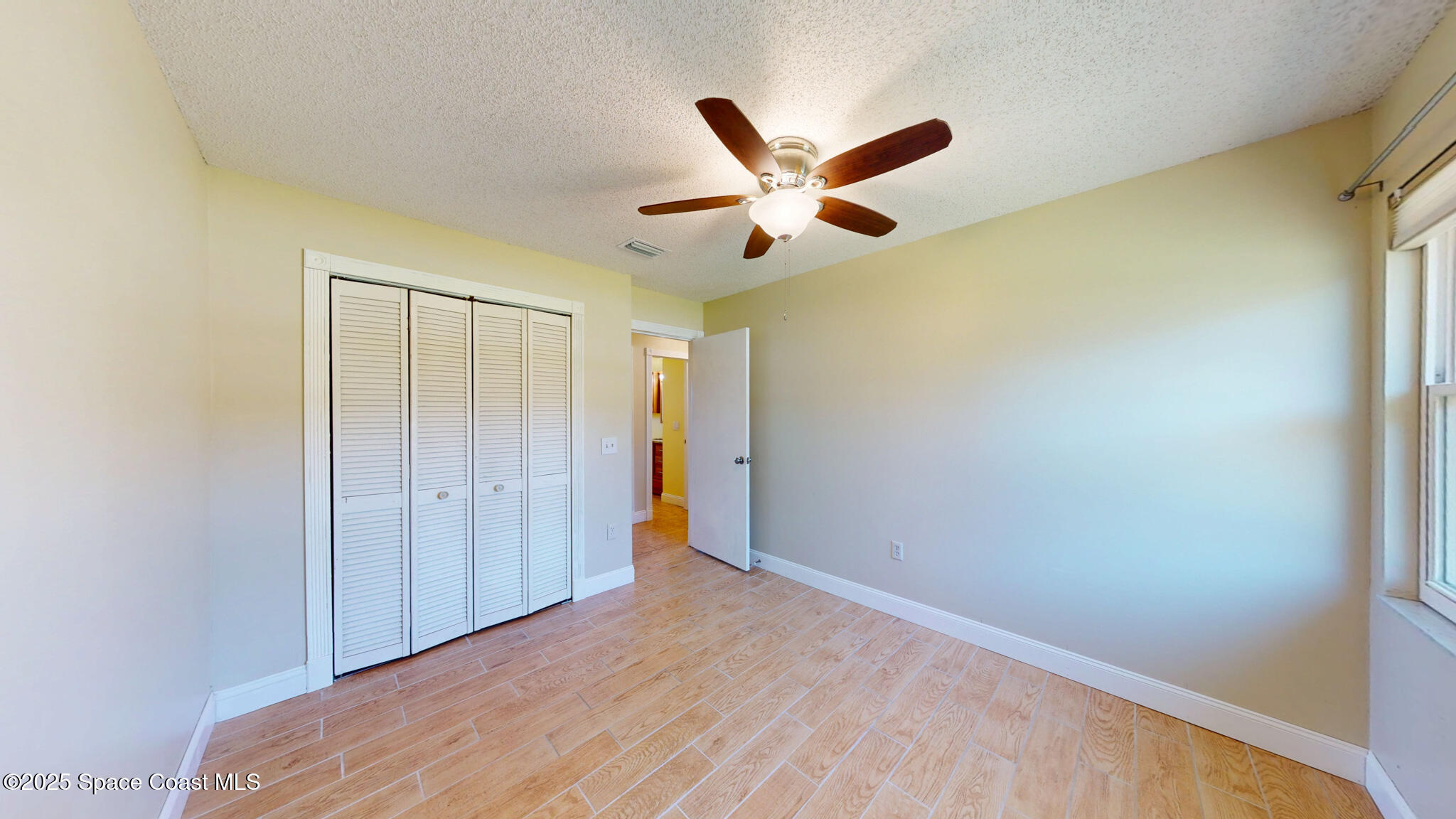 871 Southern Pine Trail Rockledge, FL 32955 - Photo 23 of 36 a view of an empty room