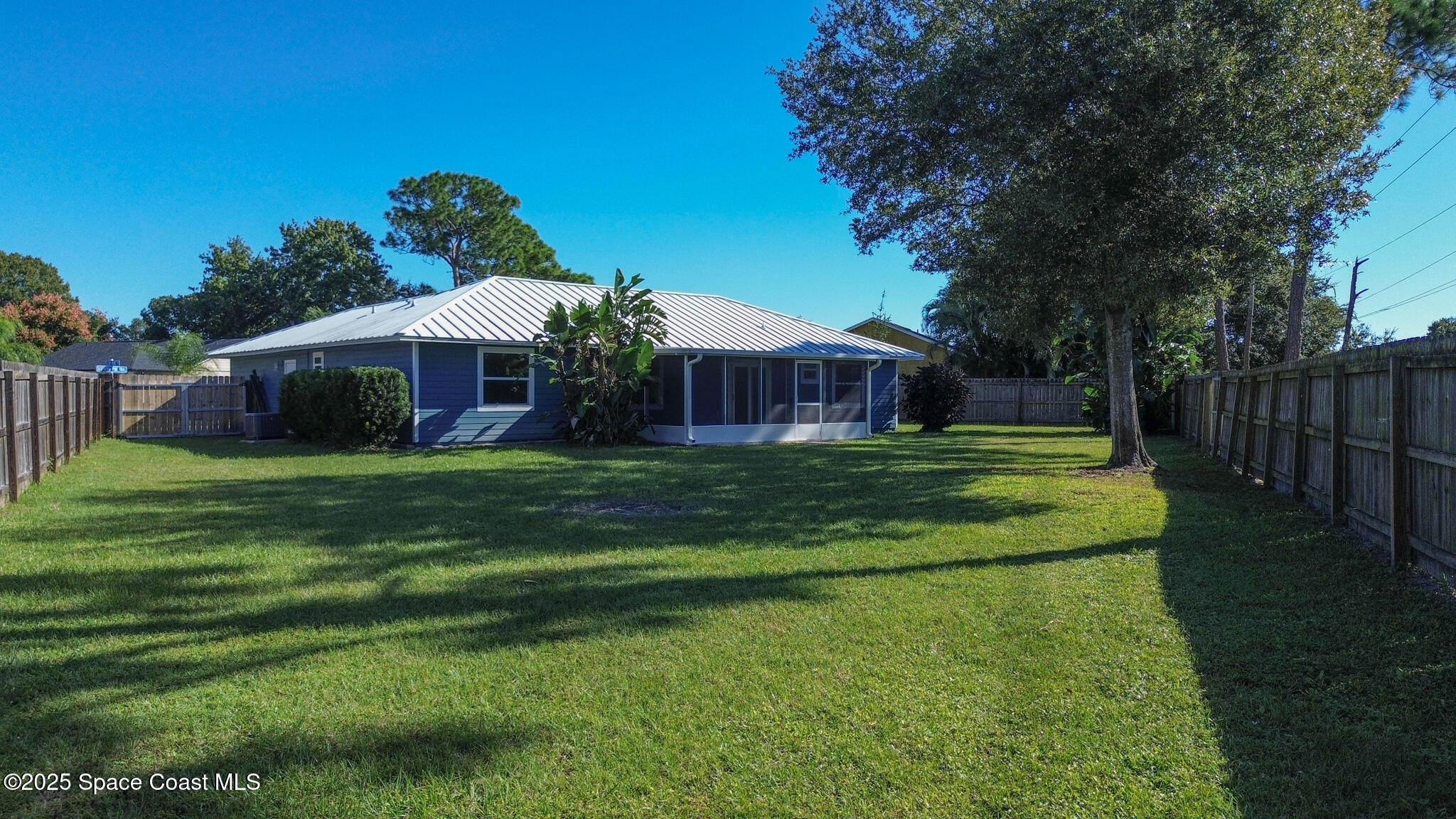 871 Southern Pine Trail Rockledge, FL 32955 - Photo 32 of 36 a front view of a house with garden