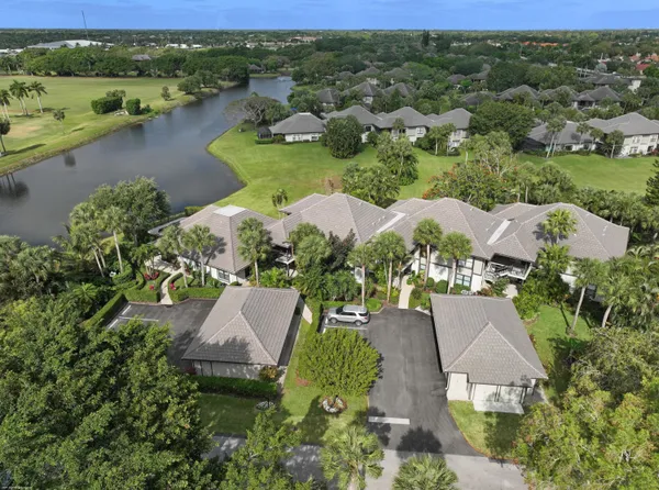 an aerial view of lake residential houses with outdoor space and river