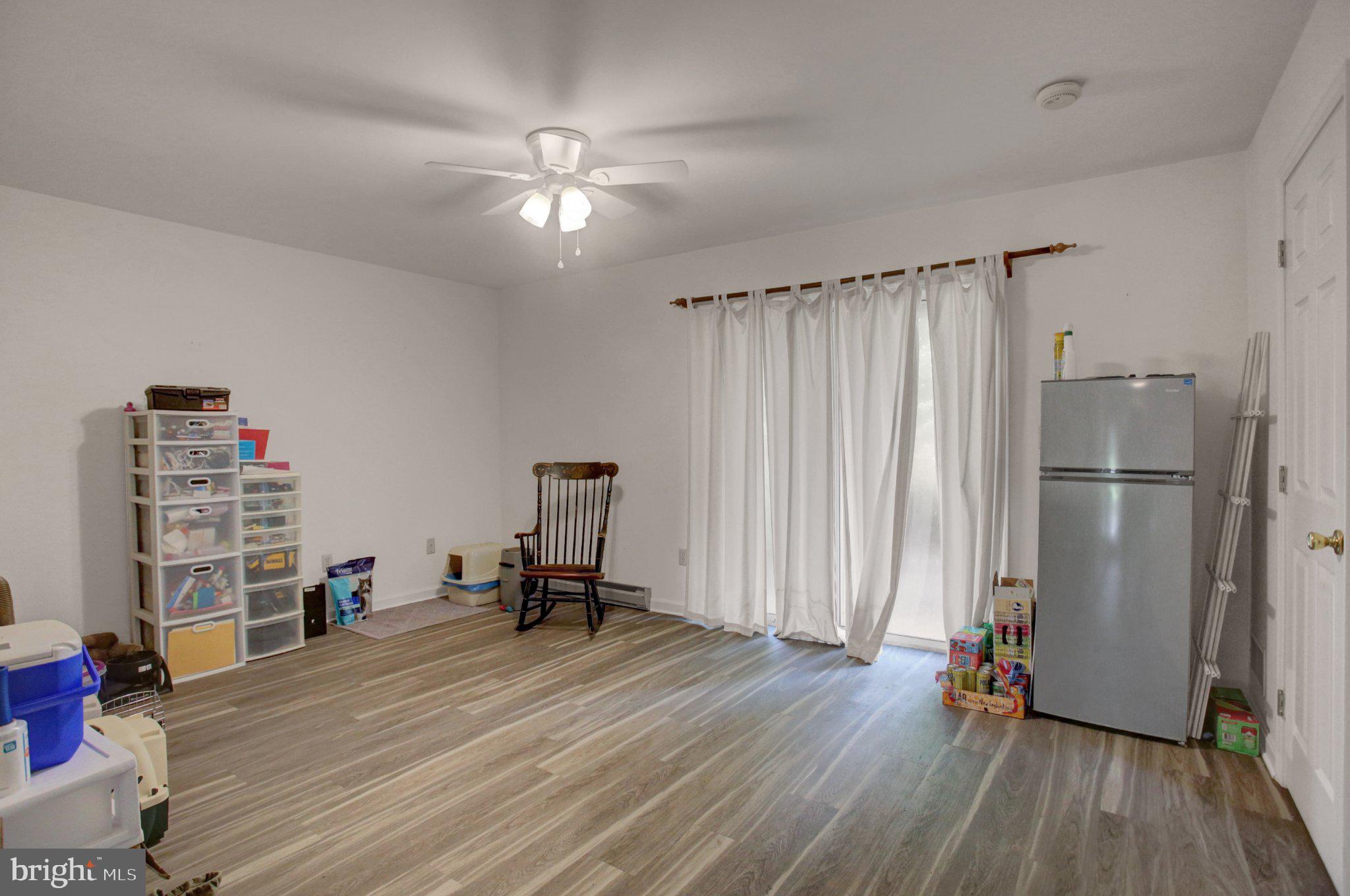 1557 Brechbill Road Chambersburg, PA 17202 - Photo 7 of 33 Bright & airy versatile space. Patio door in rear