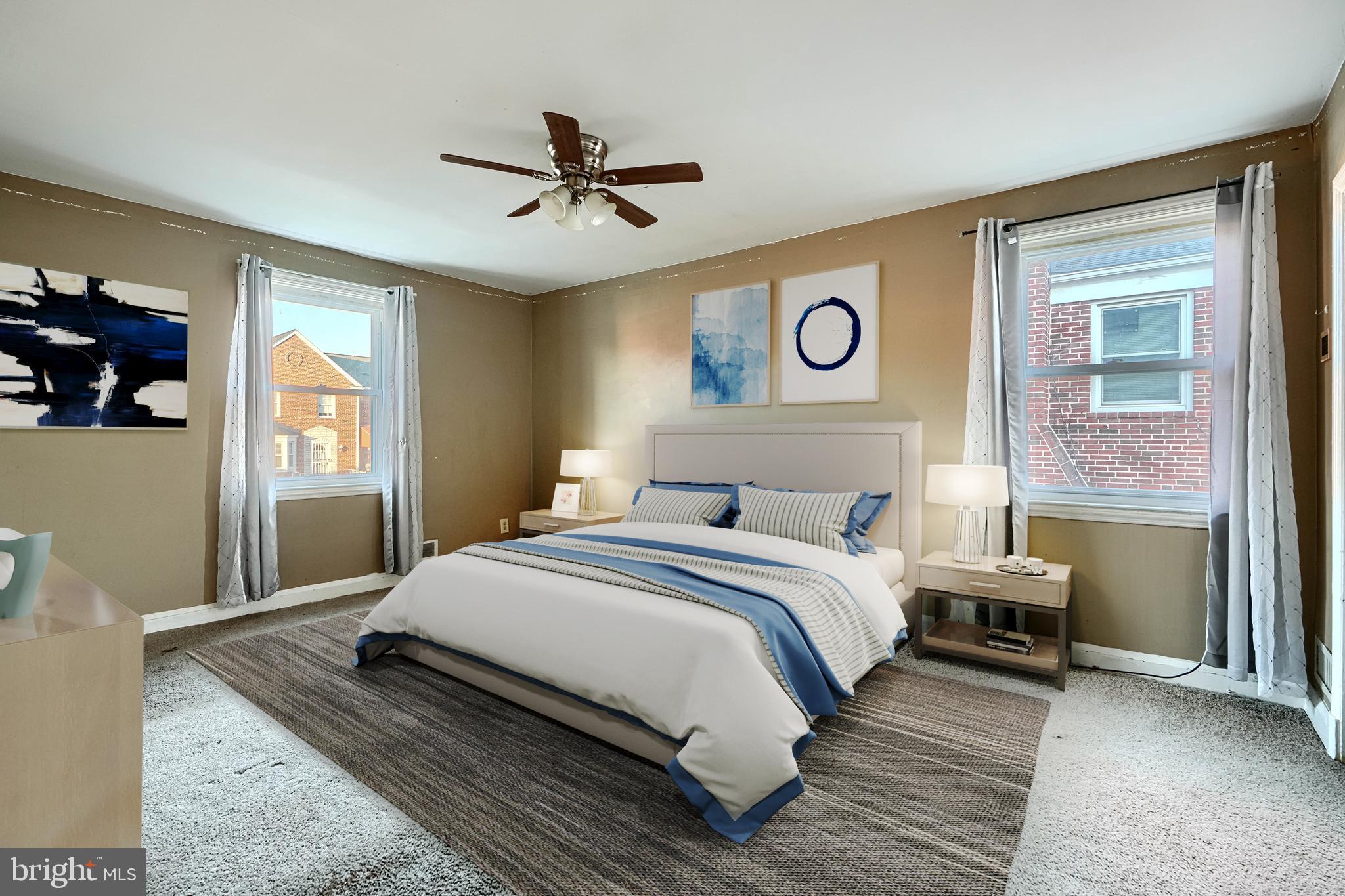 1517 Medford Road Baltimore, MD 21218 - Photo 19 of 27 a bedroom with a bed and a window