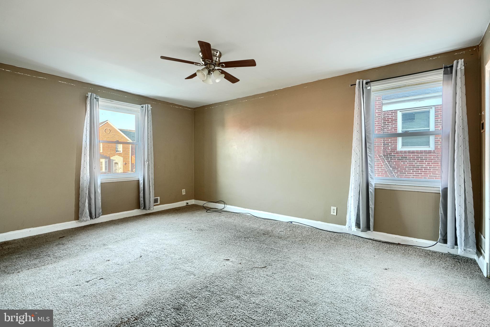 1517 Medford Road Baltimore, MD 21218 - Photo 20 of 27 a view of an empty room with a window