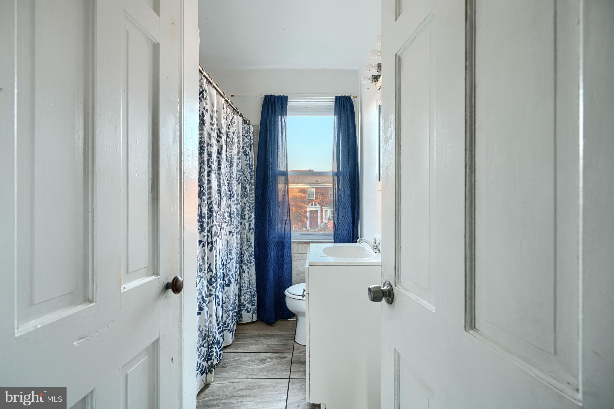 1517 Medford Road Baltimore, MD 21218 - Photo 21 of 27 a bathroom with a shower