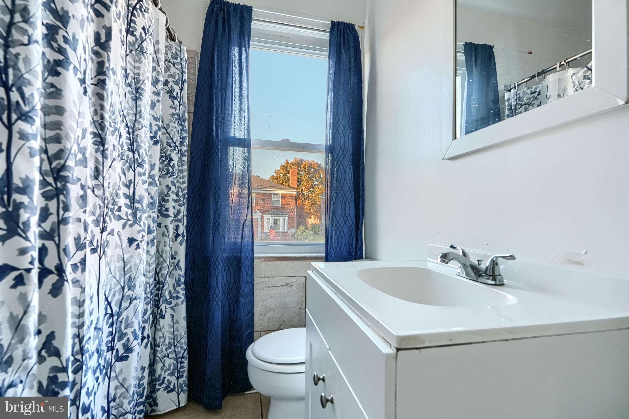 1517 Medford Road Baltimore, MD 21218 - Photo 22 of 27 a bathroom with a sink and a toilet