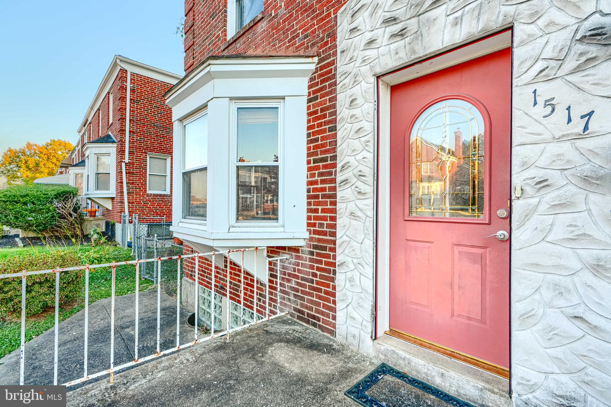 1517 Medford Road Baltimore, MD 21218 - Photo 3 of 27 a front view of a house with a porch