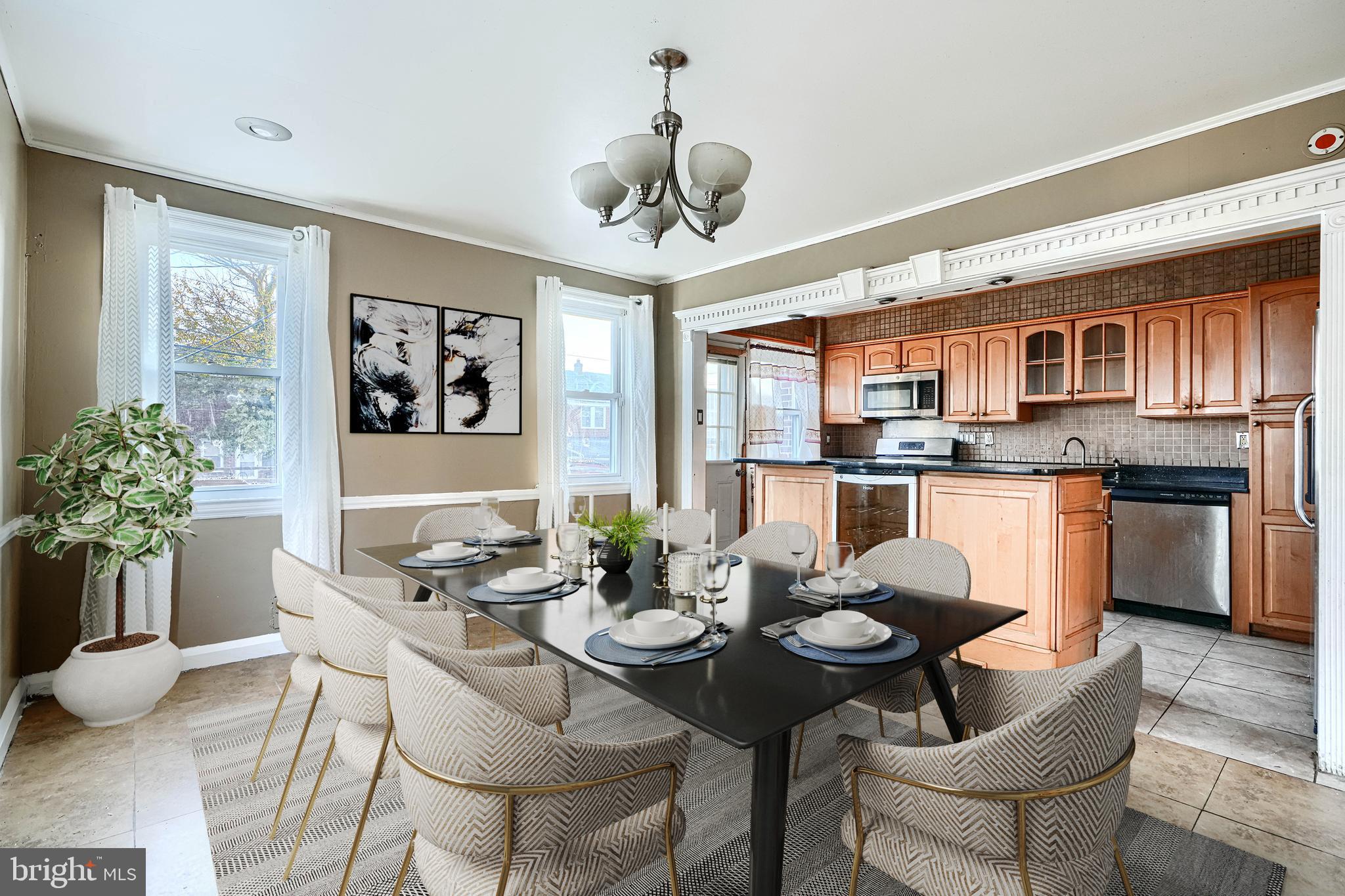 1517 Medford Road Baltimore, MD 21218 - Photo 10 of 27 a view of a dining room with furniture window and wooden floor