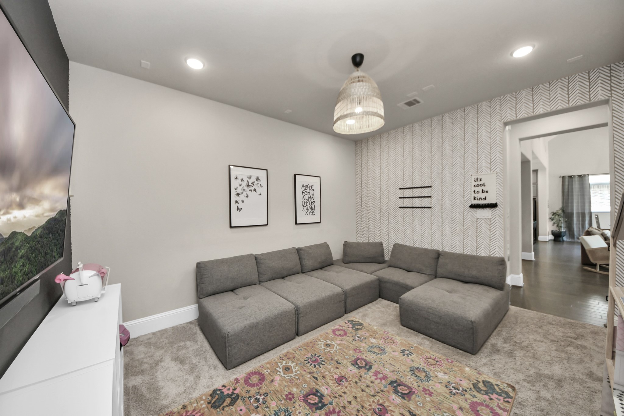 633 Ashbrook Ridge Lane Pinehurst, TX 77362 - Photo 16 of 35 a living room with furniture wooden floor and a large window