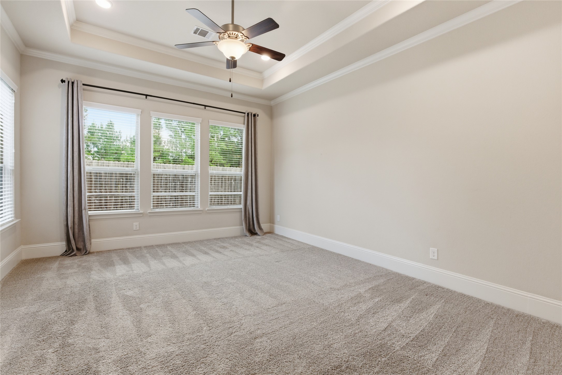 633 Ashbrook Ridge Lane Pinehurst, TX 77362 - Photo 17 of 35 a view of an empty room with a window