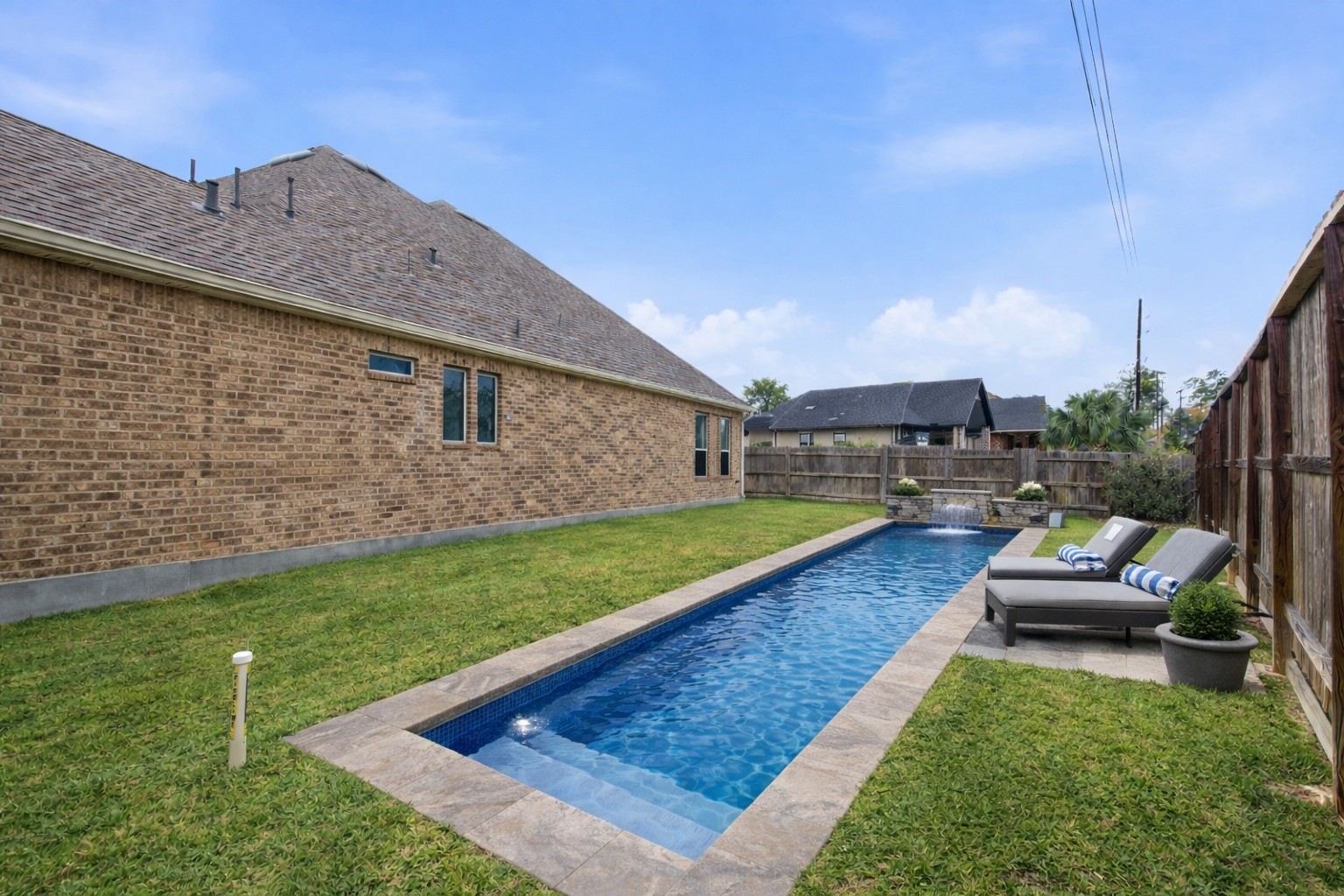 633 Ashbrook Ridge Lane Pinehurst, TX 77362 - Photo 29 of 35 a view of a backyard with swimming pool